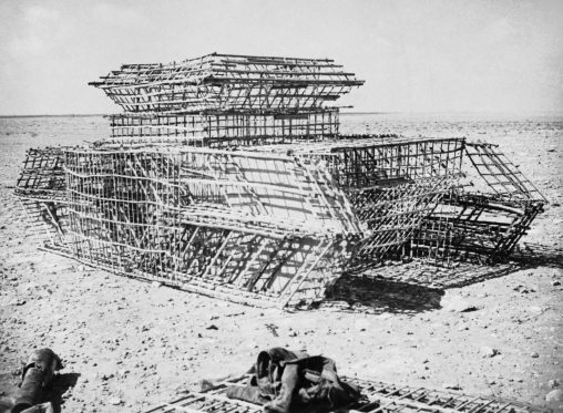 Framework of a dummy tank under construction at the Middle East School of Camouflage in the Western Desert, 1942.
Photo: Gerald Leet (British Army, YWM)