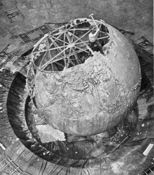 Demolition of the globe in the Ford Rotunda, Dearborn, Michigan, after the fire which destroyed the complex in 1962.