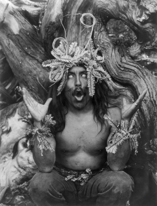Hamatsa ritualist (British Coluimbia), 1914
"Hamatsa emerging from the woods--Koskimo" "Hamatsa shaman, three-quarter length portrait, seated on ground in front of tree, facing front, possessed by supernatural power after having spent several days in the woods as part of an initiation ritual."
Photo: Edward S. Curtis