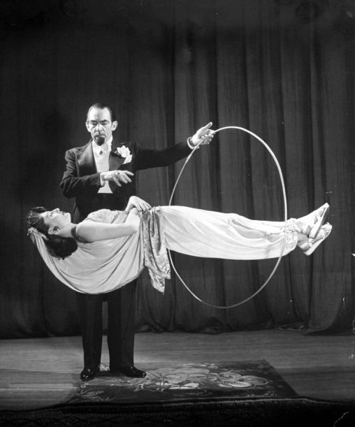 Jack Gwynne performing a levitation trick at the Magicians Convention, NY, 1947.
(Photo by George Karger/LIFE)