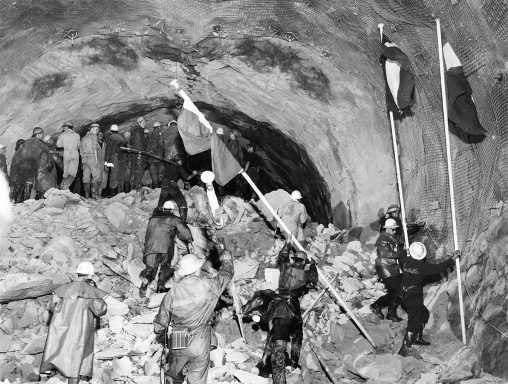 Meeting of the Italian and French drilling parties during the construction of the Mont Blanc Tunnel, 14 August 1962 .