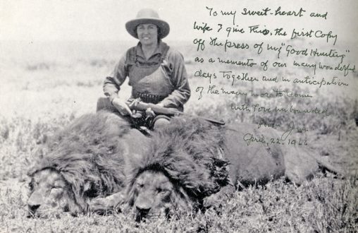Sally Clark poses with two lions she bagged on the Serengetti Plains in 1928. The Clarks were collecting specimens for the American Museum of Natural History.