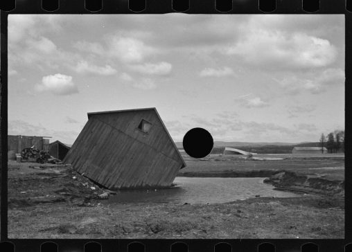 Paul Carter, Untitled photo, possibly related to: Tobacco fields devastated by the Connecticut River near Northampton, Massachusetts, March 1936.
Photo killed with a hole puncher, resulting in a black hole, 1930’s.
This photo is part of the Farm Security Administration (FSA) documentary program, setup during the Great Depression, in USA.
